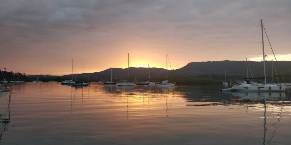 Sunset over Luperon Harbor on a calm evening.