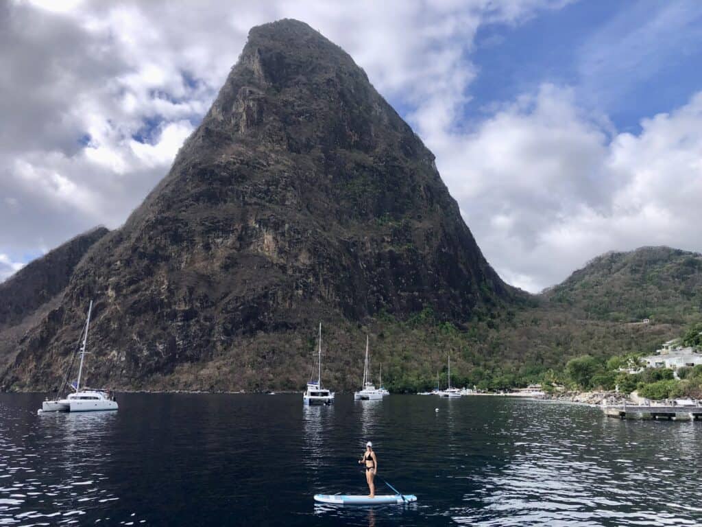 I am paddleboarding in the mooring field in between the Pitons on a very calm day.